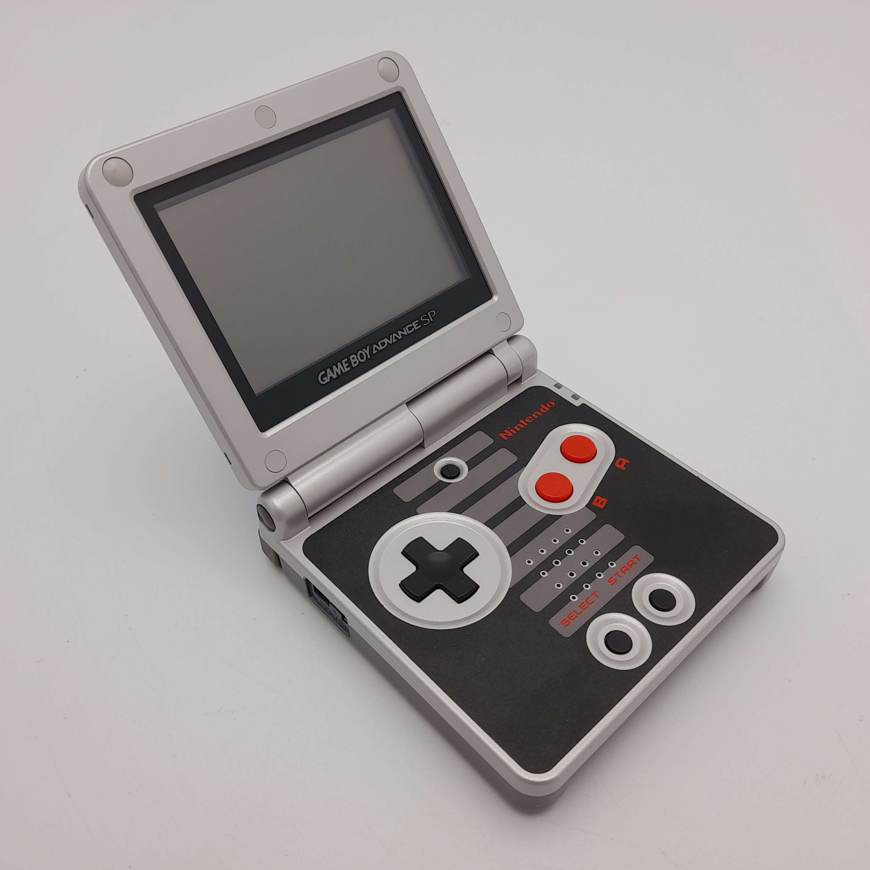 Foto van Game Boy Advance SP NES Classic Design - Zeer Mooi and in Doos