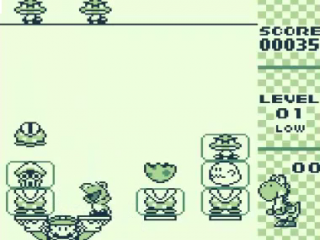 Try to get 2 eggshells in the same column to hatch a little Yoshi.